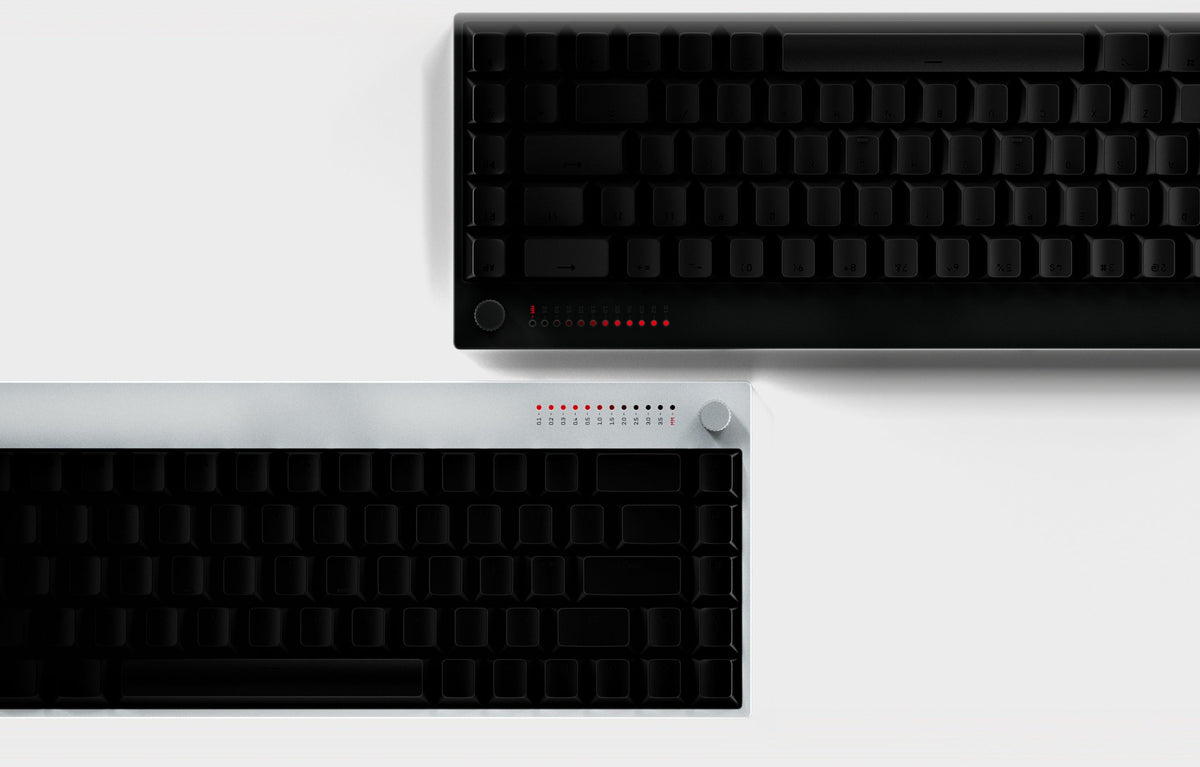 K-001 keyboards in Slate and Natural seen from above